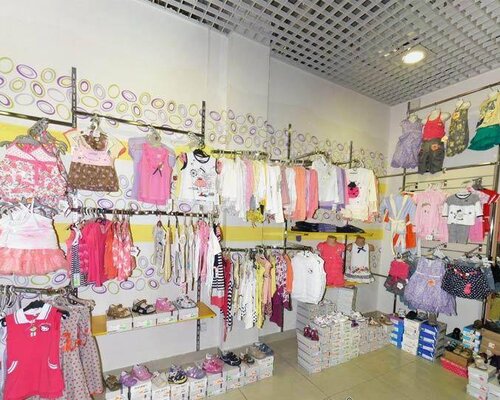 Фотография обувного магазина Детская одежда и игрушки