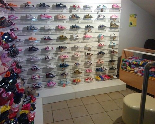 Фотография обувного магазина Сапожки Фотография обувного магазина Сапожки